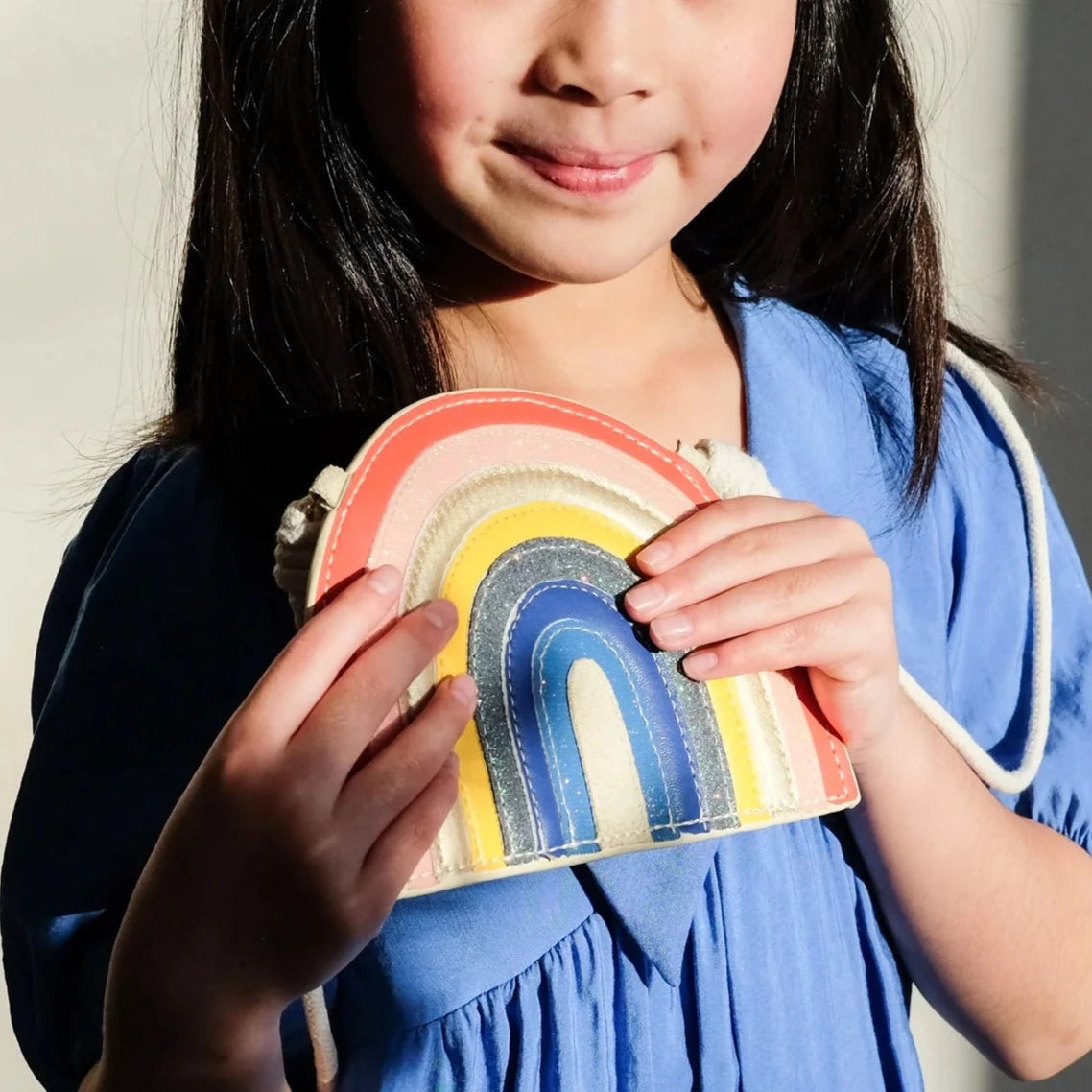 Rainbow shaped outlet purse