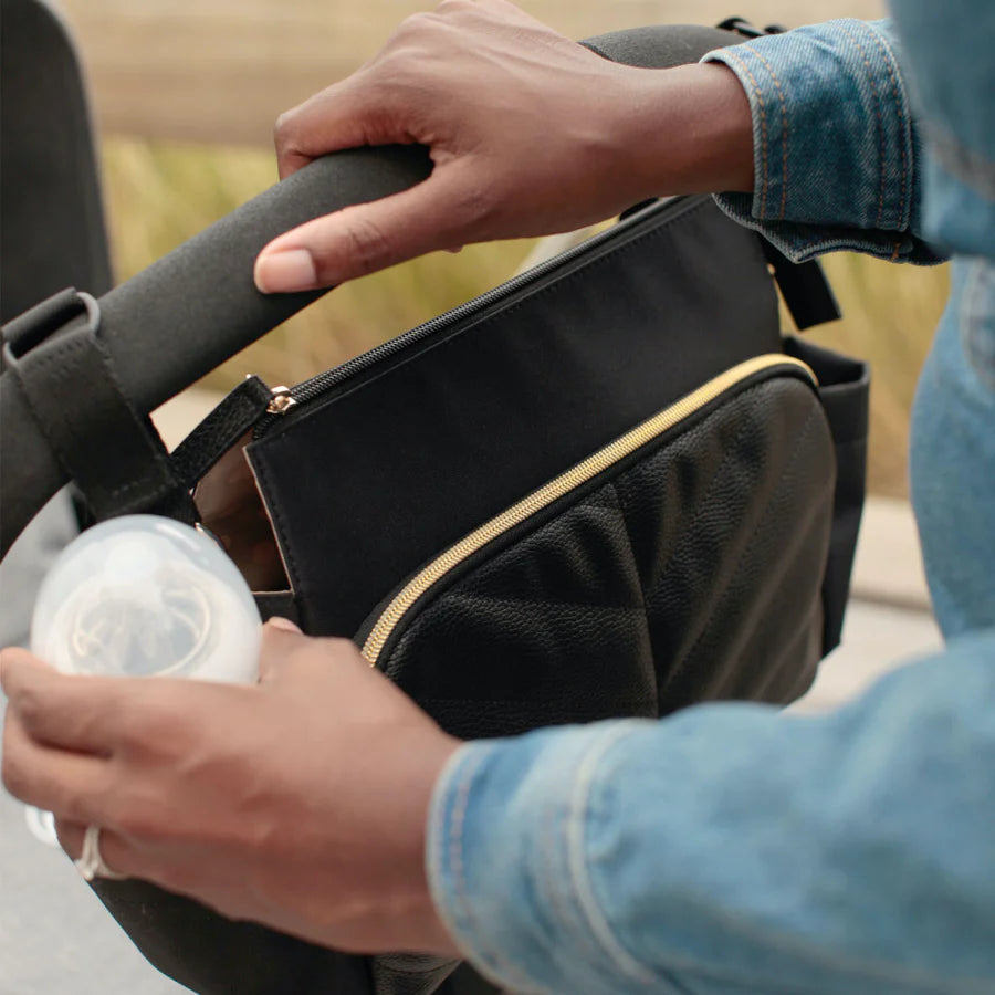 Diaper bag that attaches online to stroller