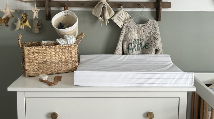 Wedge changing mat in a nursery set up