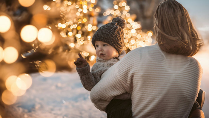 Baby wrapped in a neutral cozy blanket