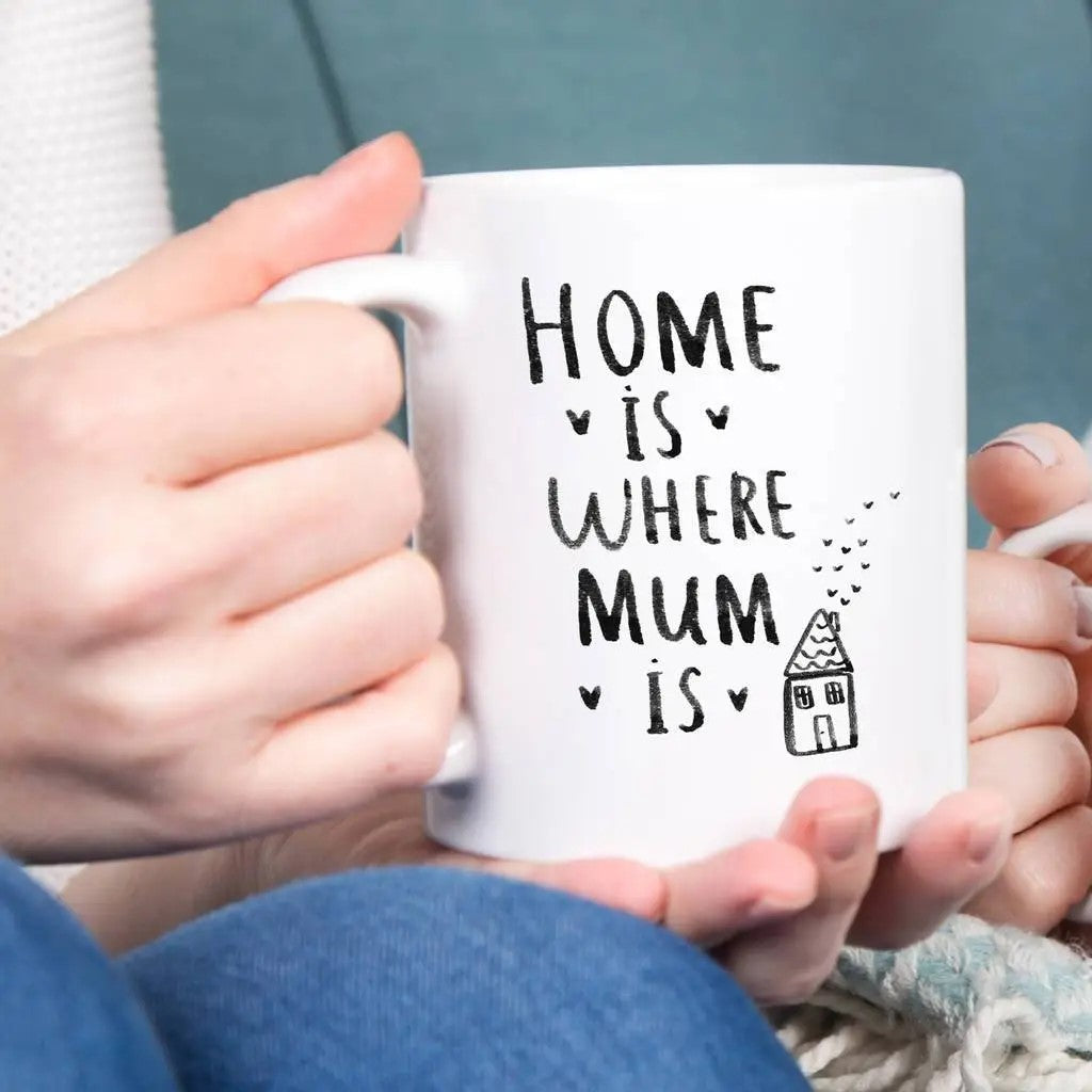 Image features handmade mug with a print -Home is where Mum is