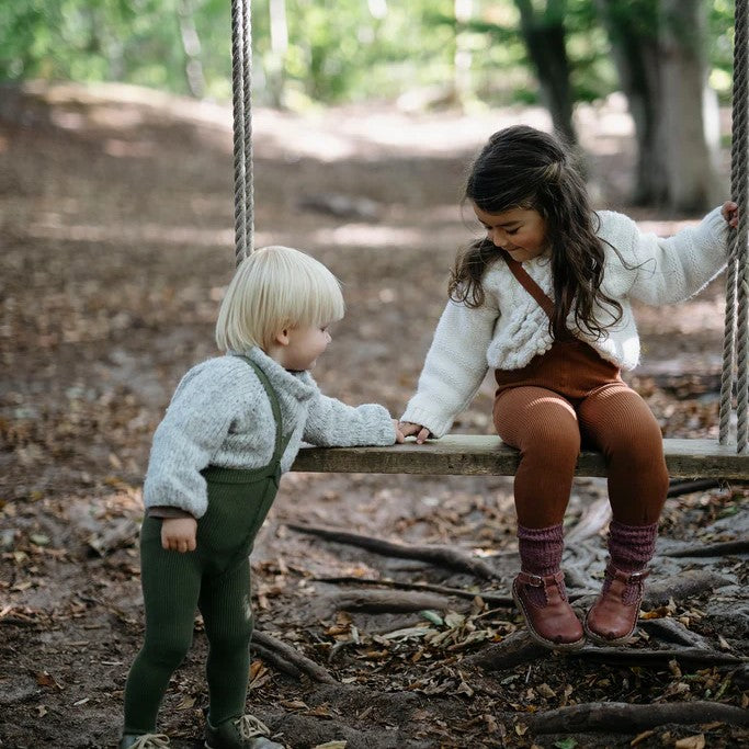 Silly Silas creates sustainable timeless practical tights. Image features two children wearing footless and footed tights