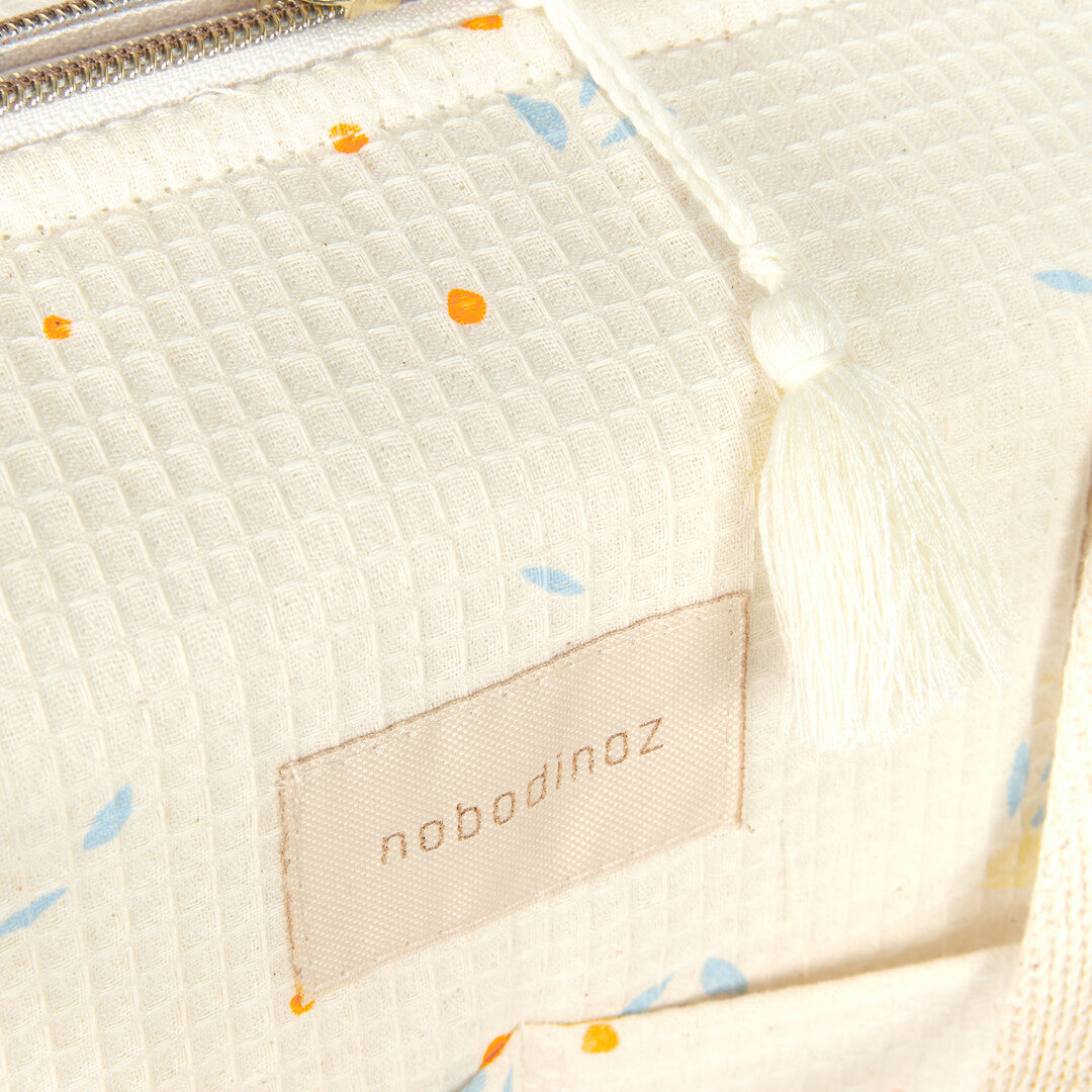 Nobodinoz- Waterproof Changing Bag - Gala Opera - Orange Cherries
