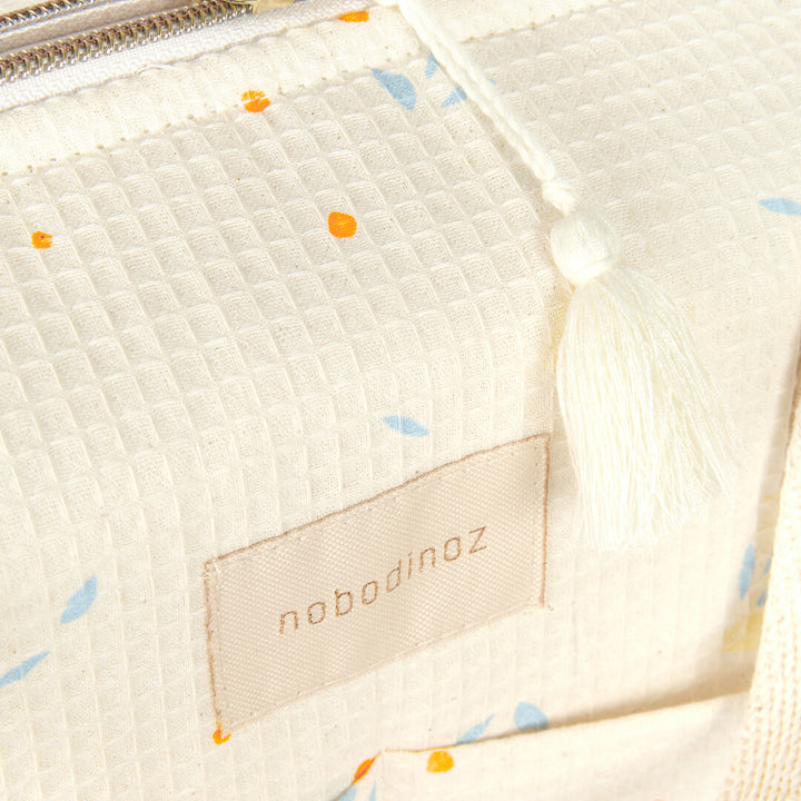 Nobodinoz- Waterproof Changing Bag - Gala Opera - Orange Cherries