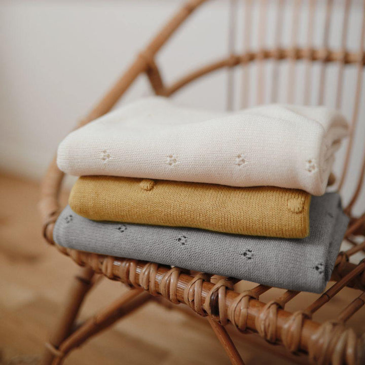 Mushie - Knitted Baby Blanket -Textured Dots Mustard Melange