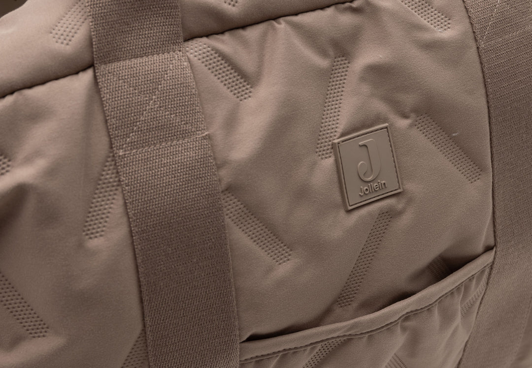 Jollein - Changing Bag - Embossed Milky Coffee - Mabel & Fox