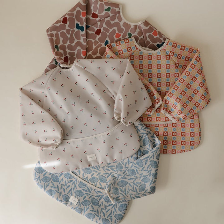 Mushie - Long Sleeve Bib - Blue Flowers - Mabel & Fox