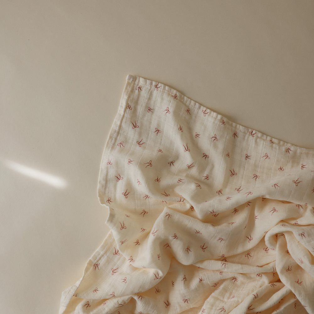 Mushie - Organic Swaddle - Bows - Mabel & Fox