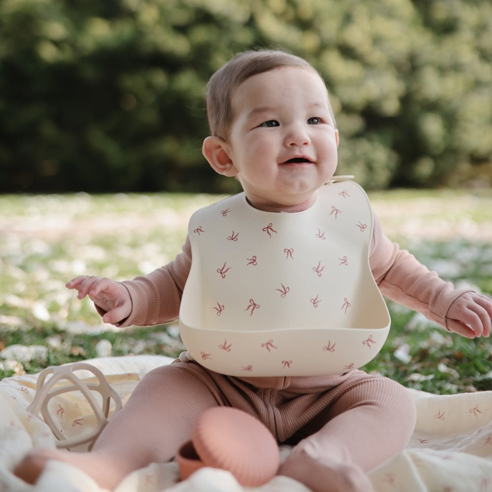Mushie - Silicone Bib - Bows - Mabel & Fox