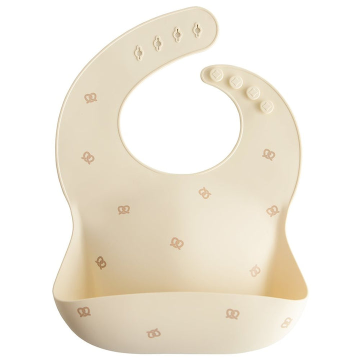Mushie - Silicone Bib - Pretzel - Mabel & Fox