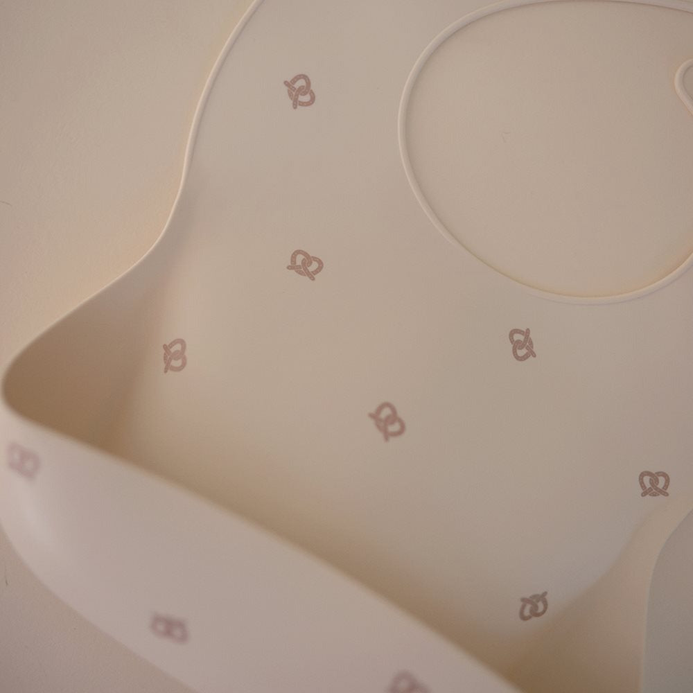 Mushie - Silicone Bib - Pretzel - Mabel & Fox