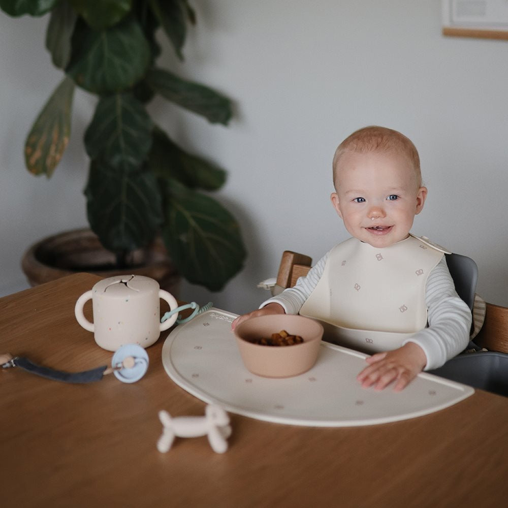 Mushie - Silicone Bib - Pretzel - Mabel & Fox
