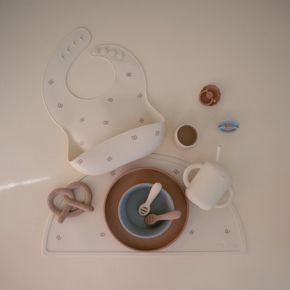 Mushie - Silicone Bib - Pretzel - Mabel & Fox