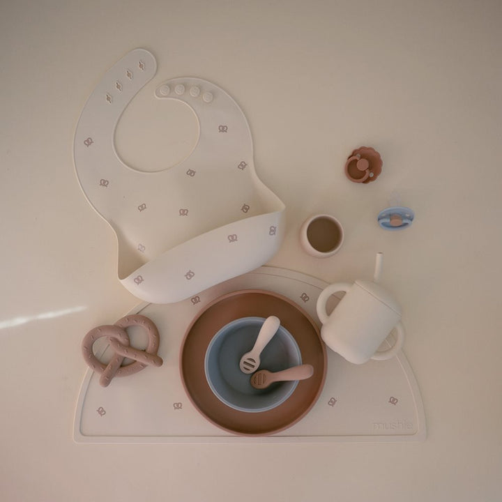 Mushie - Silicone Bib - Pretzel - Mabel & Fox
