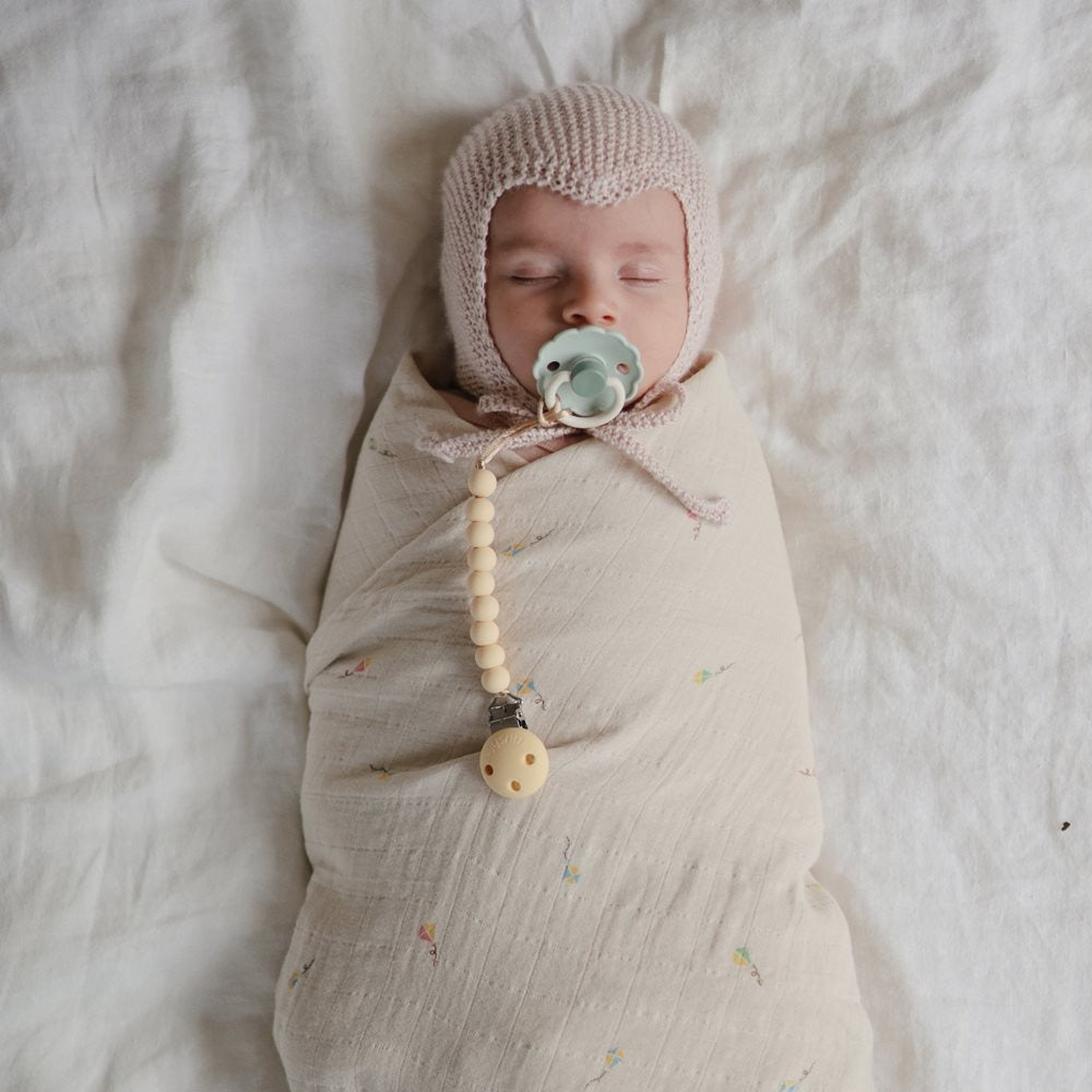 Mushie - Silicone Pacifier Clip - Hera Pale Yellow - Mabel & Fox