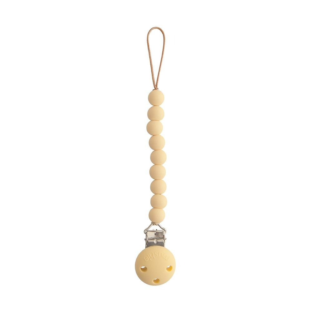 Mushie - Silicone Pacifier Clip - Hera Pale Yellow - Mabel & Fox