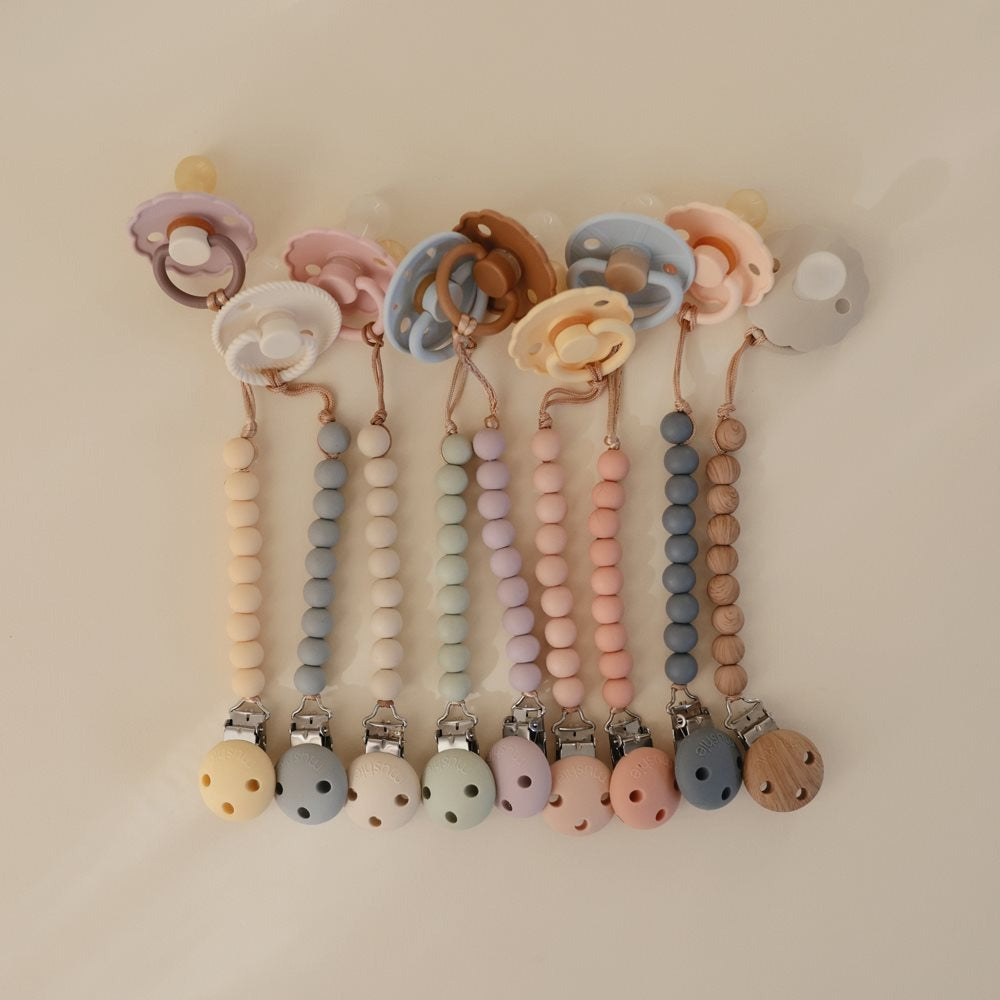 Mushie - Silicone Pacifier Clip - Hera Pale Yellow - Mabel & Fox
