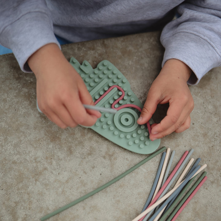 Mushie - Silicone Sensory Toy - Rocket