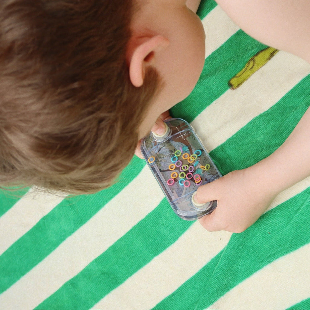 Konges Slojd – Water Ring Game – Dinomite - Mabel & Fox