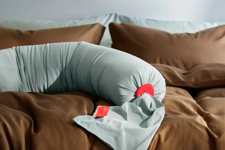 Control the firmness of the bbhugme pregnancy pillow with the pebbles at each end