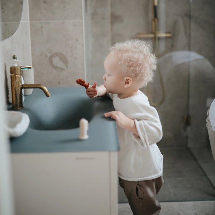 Mushie - Finger Toothbrush Stone/Tradewinds - Mabel & Fox